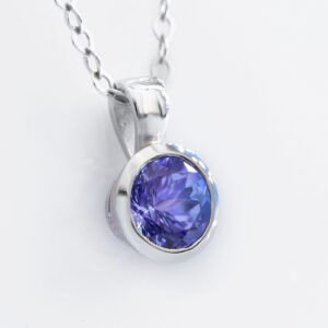 9K White Gold Tanzanite Total 0.76 Carat Tube Set Pendant