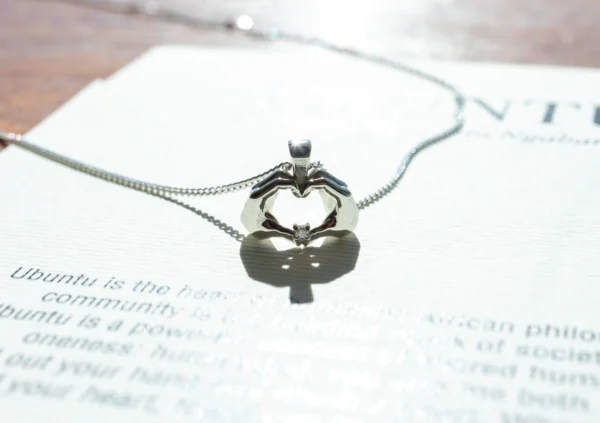 UBUNTU pendant with natural white petite diamond set in sterling silver with chain - Image 2