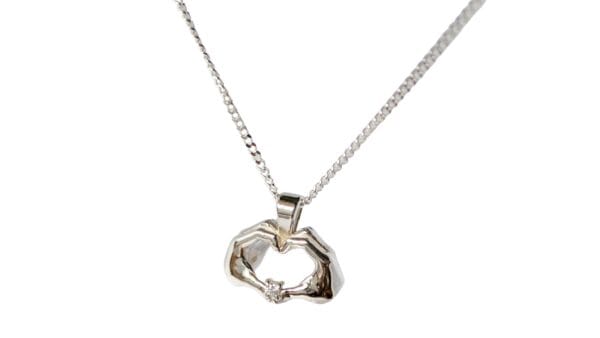 UBUNTU pendant with natural white petite diamond set in sterling silver with chain